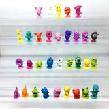 50pcs/lot Mini Monster Sucker Capsule Model Little Cartoon Anime Animal Action Figures Suction Cup Puppets Toys For Children ZXH
